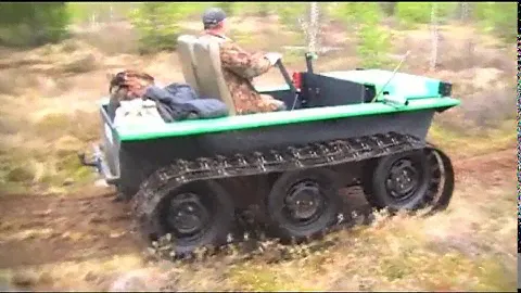 Вездеход Охотец с расширителями по болоту в Сургуте